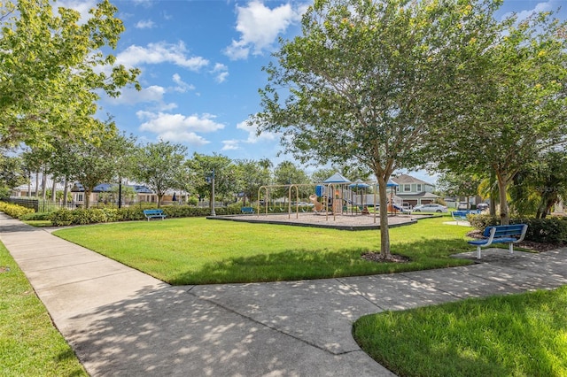 13421 Lake Monroe Pl, Riverview, FL 33579 - surrounding community with a yard