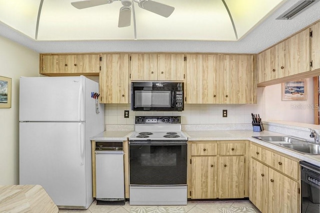172 Lakeview Way Unit 172, Oldsmar, FL 34677 - kitchen with black appliances, light brown cabinetry, a sink, and light countertops