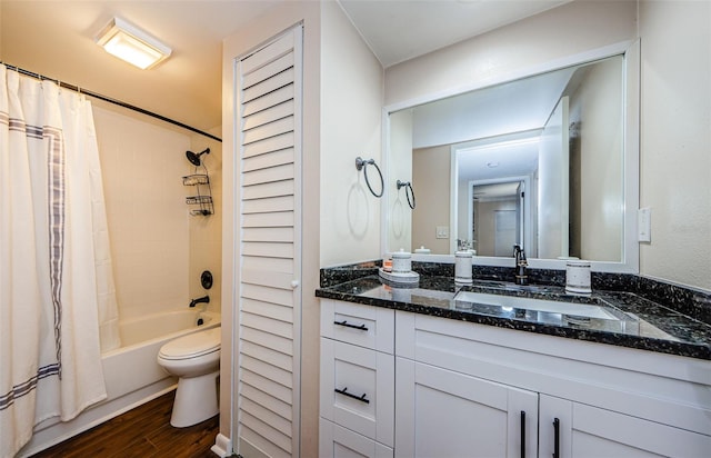 2706 11th Ct, Palm Harbor, FL 34684 - bathroom with wood finished floors, toilet, shower / bath combo, and vanity