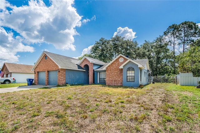 1024 Dockside Dr, Lutz, FL 33559 - ranch-style house featuring concrete driveway and brick siding