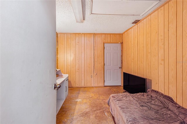 1024 Dockside Dr, Lutz, FL 33559 - bedroom featuring wood walls and concrete floors