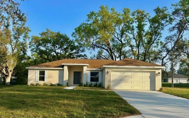 1259 Groveland Ln, Lakeland, FL 33811 - ranch-style house featuring a garage, stucco siding, concrete driveway, and a front lawn