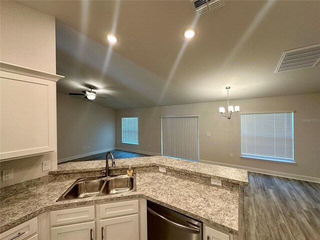 1259 Groveland Ln, Lakeland, FL 33811 - kitchen with stainless steel dishwasher, a sink, a ceiling fan, white cabinetry, and recessed lighting