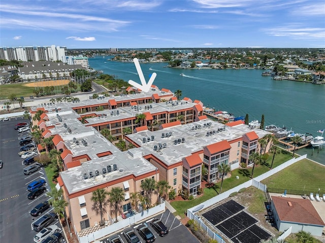 8931 Blind Pass Rd Unit 360, St Pete Beach, FL 33706 - drone / aerial view of a large body of water and apartment complex