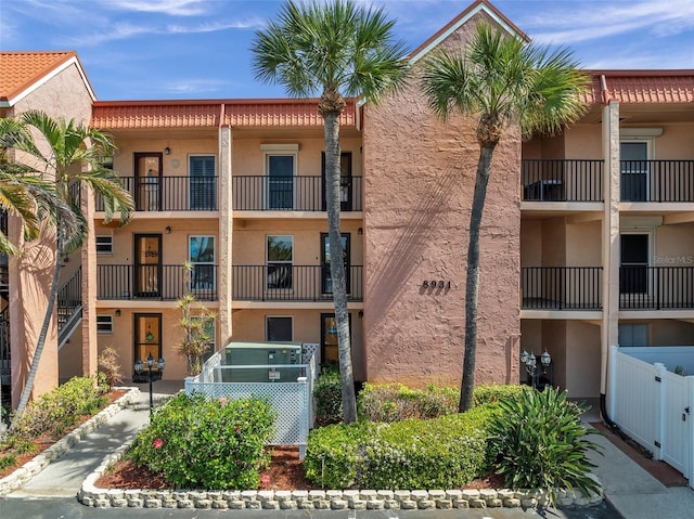8931 Blind Pass Rd Unit 360, St Pete Beach, FL 33706 - view of property featuring fence