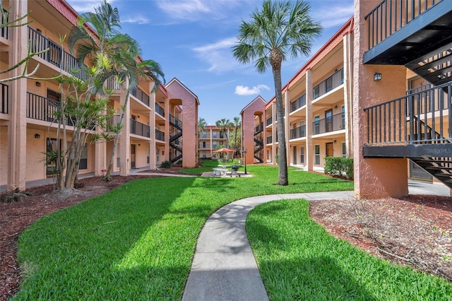 8931 Blind Pass Rd Unit 360, St Pete Beach, FL 33706 - view of property's community with a yard