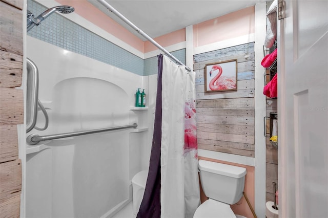 8931 Blind Pass Rd Unit 360, St Pete Beach, FL 33706 - bathroom with a shower with shower curtain and toilet