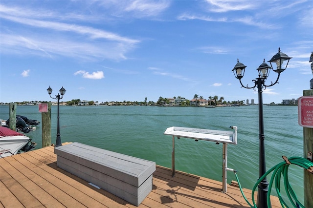 8931 Blind Pass Rd Unit 360, St Pete Beach, FL 33706 - dock featuring a water view