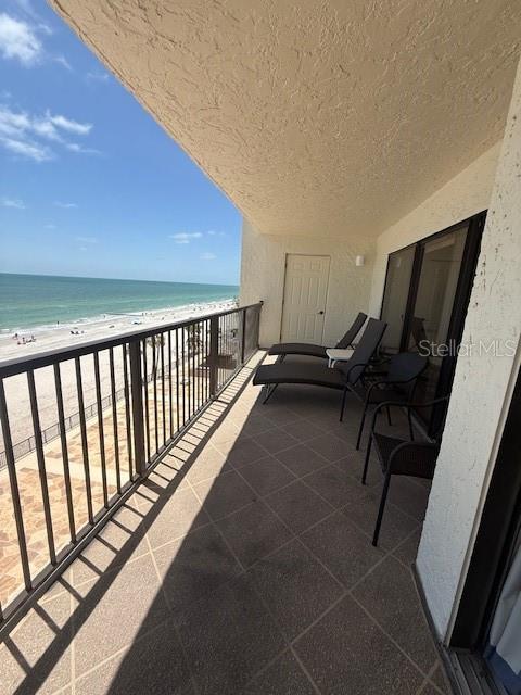 14950 Gulf Blvd Unit 603, Madeira Beach, FL 33708 - balcony with view of water and beach