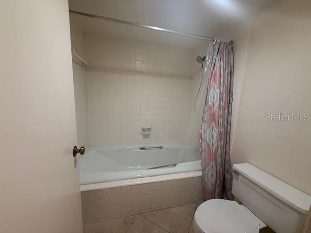 14950 Gulf Blvd Unit 603, Madeira Beach, FL 33708 - full bathroom with toilet, tile patterned flooring, and tiled shower / bath combo