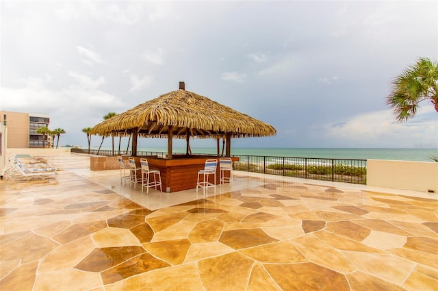 14950 Gulf Blvd Unit 603, Madeira Beach, FL 33708 - view of patio with a water view