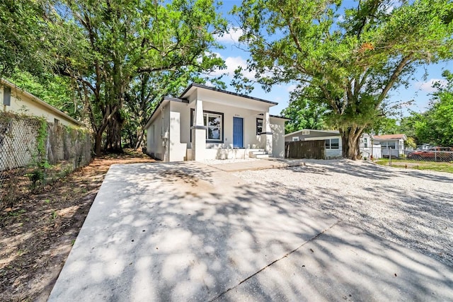 8504 N 17th St, Tampa, FL 33604 - view of front facade with stucco siding and covered porch