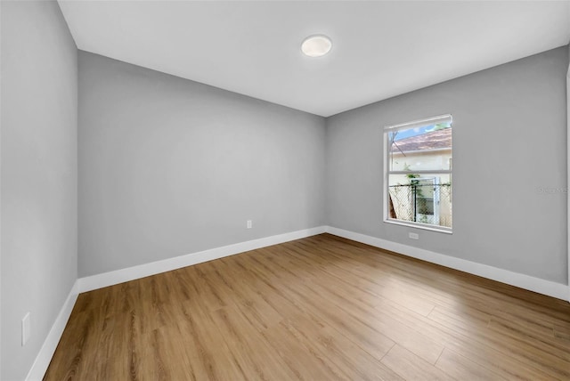 8504 N 17th St, Tampa, FL 33604 - unfurnished room featuring wood finished floors and baseboards