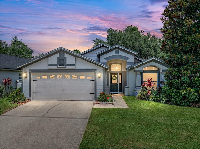 18003 Arbor Crest Dr, Tampa, FL 33647 - view of front of house with an attached garage, a front lawn, and driveway