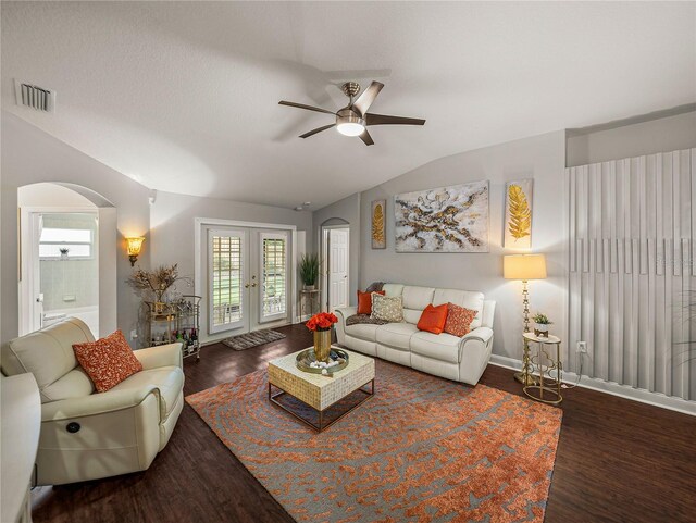 18003 Arbor Crest Dr, Tampa, FL 33647 - living area featuring arched walkways, lofted ceiling, wood finished floors, a ceiling fan, and healthy amount of natural light