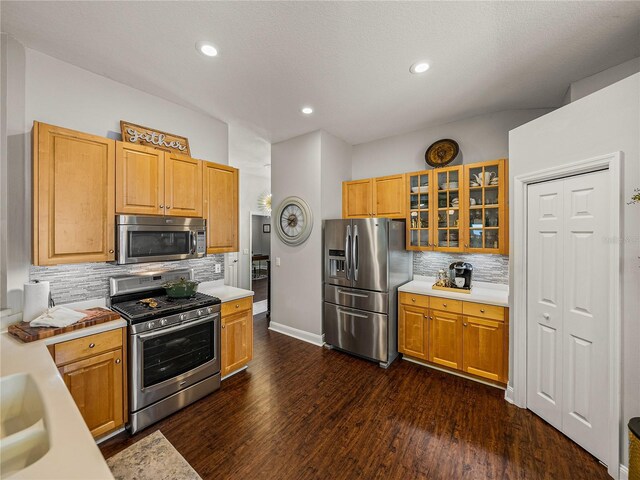 18003 Arbor Crest Dr, Tampa, FL 33647 - kitchen with appliances with stainless steel finishes, light countertops, decorative backsplash, and recessed lighting