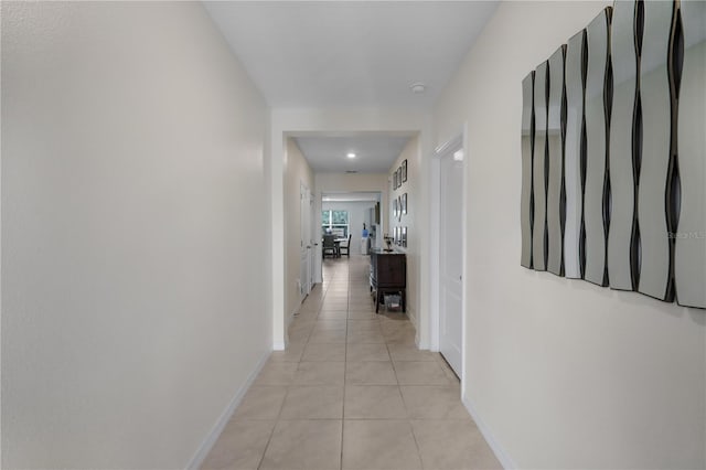 5189 Greenheart Ave, Mount Dora, FL 32757 - hallway with light tile patterned flooring and baseboards