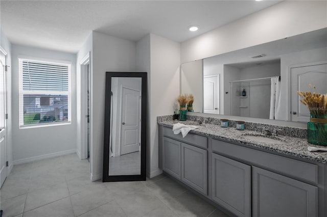5189 Greenheart Ave, Mount Dora, FL 32757 - full bathroom featuring double vanity, a shower, baseboards, tile patterned floors, and recessed lighting