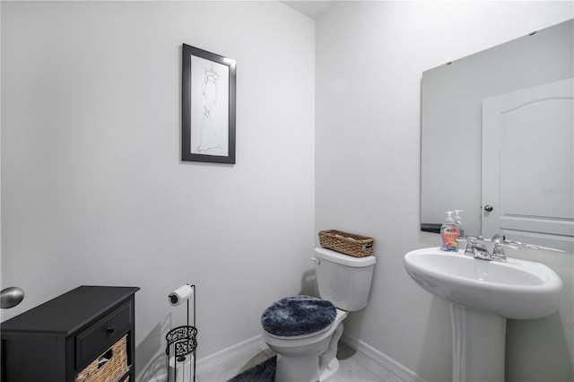 5189 Greenheart Ave, Mount Dora, FL 32757 - half bathroom featuring toilet and baseboards