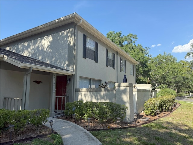 11764 Raintree Dr Unit 0, Temple Terrace, FL 33617 - view of front of home with stucco siding