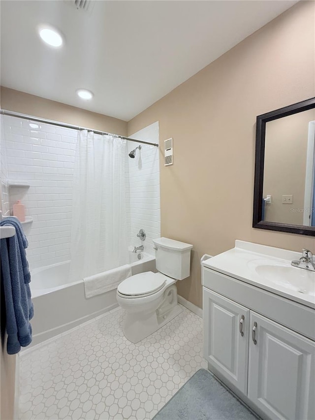 11764 Raintree Dr Unit 0, Temple Terrace, FL 33617 - full bath with toilet, shower / bathtub combination with curtain, vanity, and baseboards