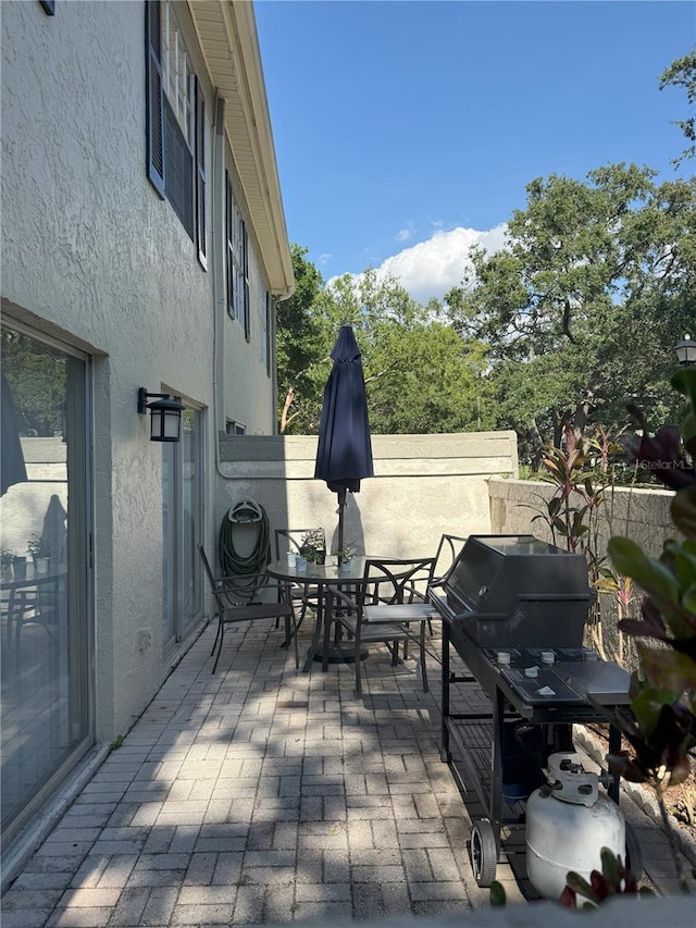 11764 Raintree Dr Unit 0, Temple Terrace, FL 33617 - view of patio with outdoor dining area and area for grilling