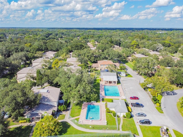 11764 Raintree Dr Unit 0, Temple Terrace, FL 33617 - aerial perspective of suburban area featuring a pool area and a heavily wooded area