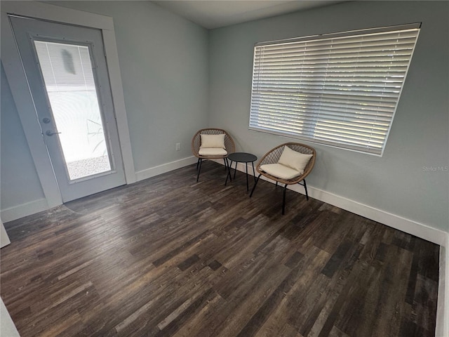3008 E 38th Ave, Tampa, FL 33610 - unfurnished room with dark wood-type flooring and baseboards