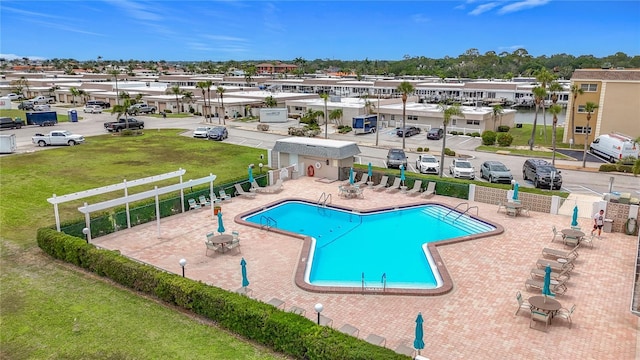 1 Boca Ciega Point Blvd Unit 215, Saint Petersburg, FL 33708 - community pool featuring a patio