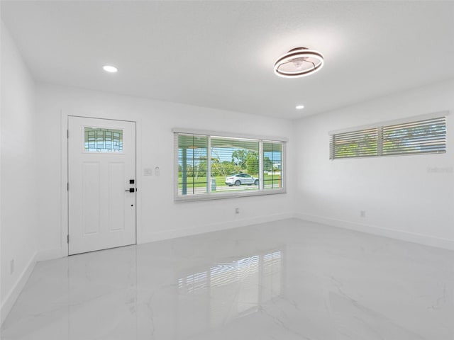 302 Patty Dr, Oldsmar, FL 34677 - entryway featuring light marble finish flooring and recessed lighting