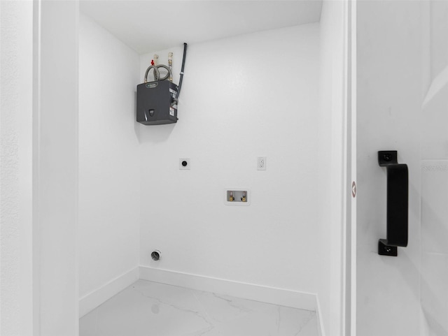 302 Patty Dr, Oldsmar, FL 34677 - laundry area with electric dryer hookup, marble look tile flooring, and washer hookup