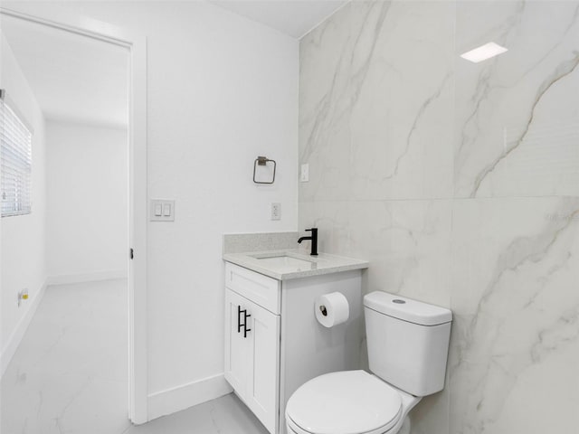 302 Patty Dr, Oldsmar, FL 34677 - bathroom featuring marble finish floors and vanity