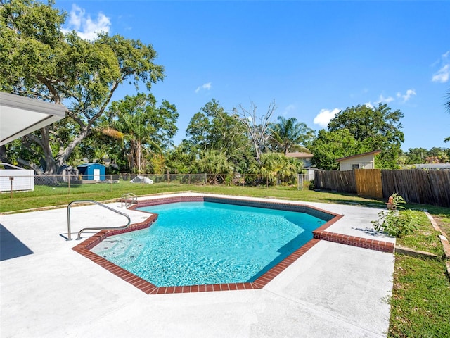 302 Patty Dr, Oldsmar, FL 34677 - view of swimming pool featuring a patio and a fenced backyard