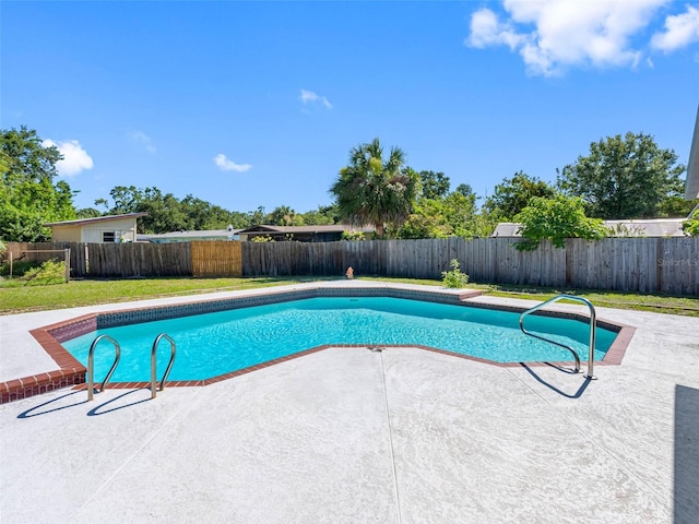 302 Patty Dr, Oldsmar, FL 34677 - view of swimming pool featuring a patio and a fenced backyard