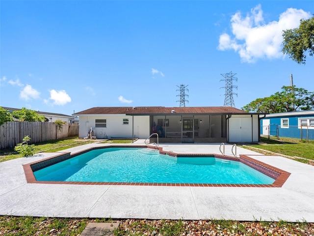 302 Patty Dr, Oldsmar, FL 34677 - view of pool with a patio and a sunroom