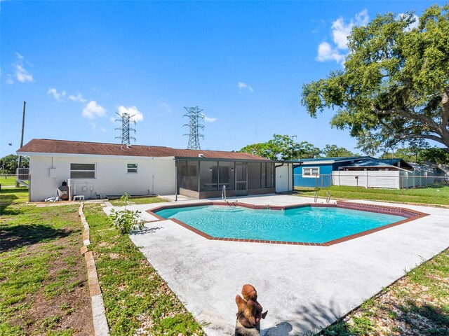 302 Patty Dr, Oldsmar, FL 34677 - view of swimming pool featuring a sunroom and a patio area