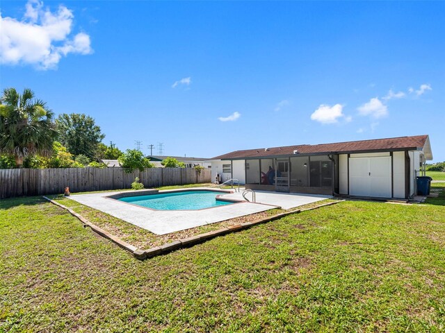 302 Patty Dr, Oldsmar, FL 34677 - view of pool featuring a fenced backyard, a sunroom, and a patio area