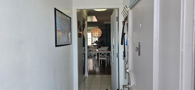 hallway with light tile patterned floors