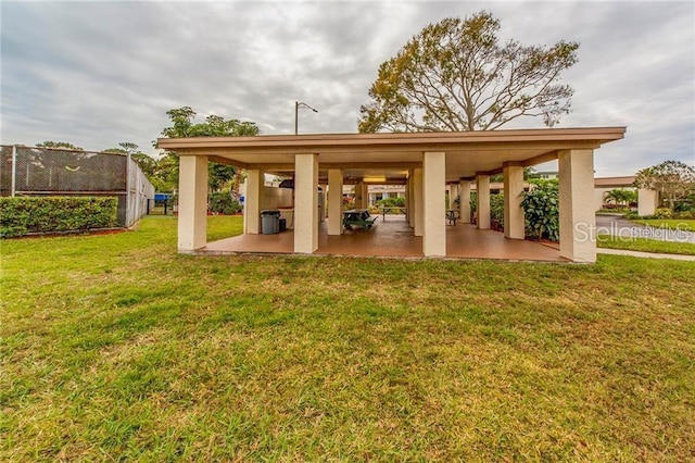 view of grassy yard featuring a patio area