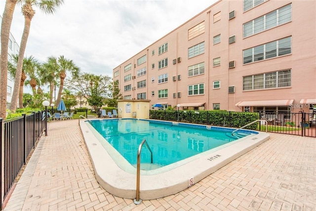 5501 80th St N Unit 207, Saint Petersburg, FL 33709 - community pool with a patio area