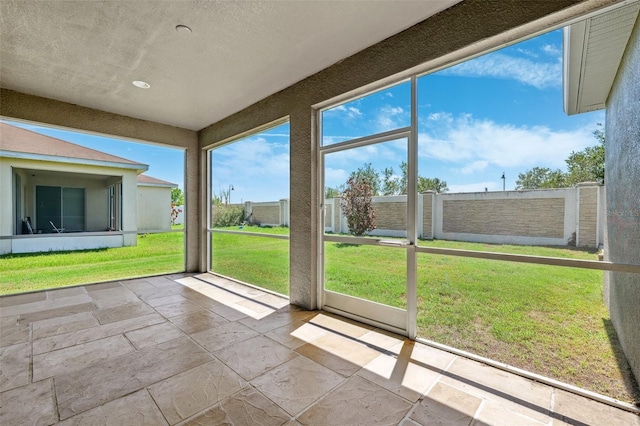 view of unfurnished sunroom