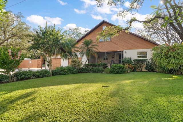 1799 Dixie Hwy, Tarpon Springs, FL 34689 - view of front of property with stucco siding and a front yard