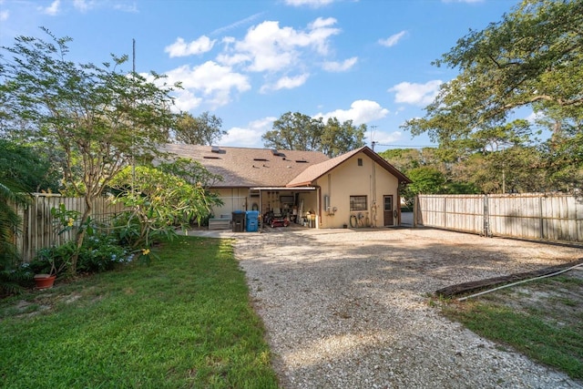 1799 Dixie Hwy, Tarpon Springs, FL 34689 - rear view of house with stucco siding
