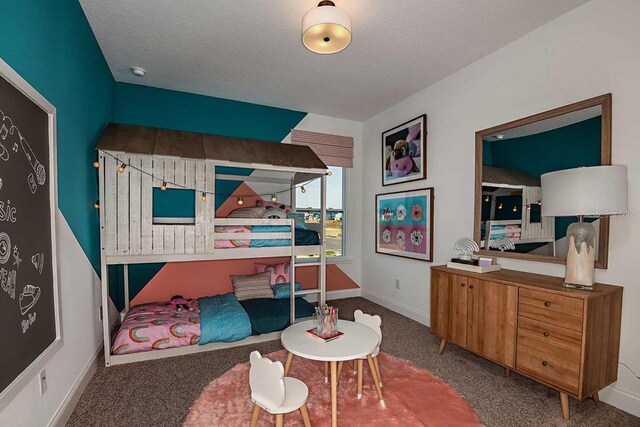 17020 Cercis Loop, Clermont, FL 34711 - carpeted bedroom featuring baseboards and a textured ceiling