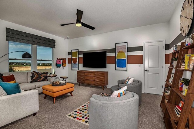 17020 Cercis Loop, Clermont, FL 34711 - carpeted living room with ceiling fan and a textured ceiling