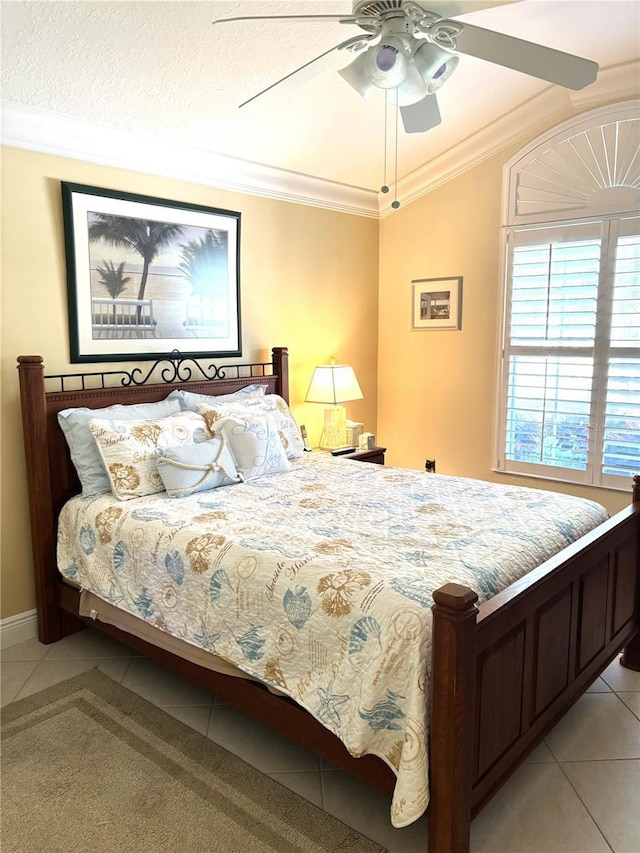 19420 Haskell Pl, Land O Lakes, FL 34638 - bedroom featuring light tile patterned flooring, ornamental molding, a ceiling fan, and baseboards