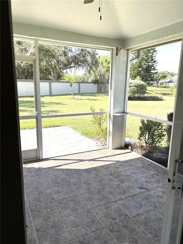 19420 Haskell Pl, Land O Lakes, FL 34638 - unfurnished sunroom with ceiling fan