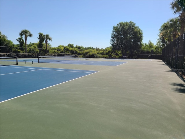 19420 Haskell Pl, Land O Lakes, FL 34638 - view of tennis court featuring community basketball court