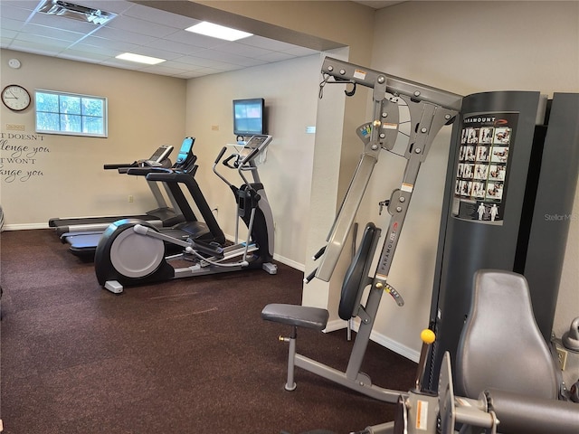 19420 Haskell Pl, Land O Lakes, FL 34638 - exercise room featuring baseboards and a drop ceiling