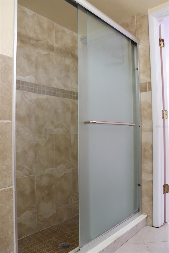 11014 Peking Pl, Tampa, FL 33624 - full bath featuring a shower stall and tile patterned floors
